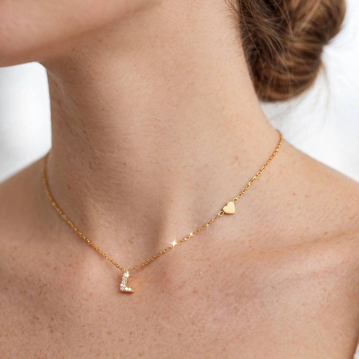Collana dorata in acciaio inossidabile con iniziale e zirconi