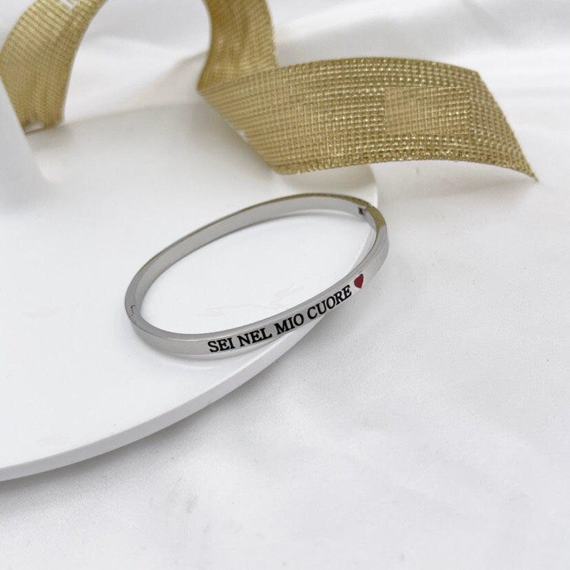 Bracciale braccialetto con scritta frase in acciaio argento e dintorni