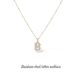 Collana iniziale lettera bombata in acciaio inossidabile colore oro e strass