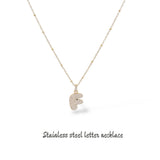 Collana iniziale lettera bombata in acciaio inossidabile colore oro e strass
