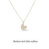 Collana iniziale lettera bombata in acciaio inossidabile colore oro e strass