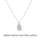Collana iniziale lettera bombata in acciaio inossidabile colore argento e strass