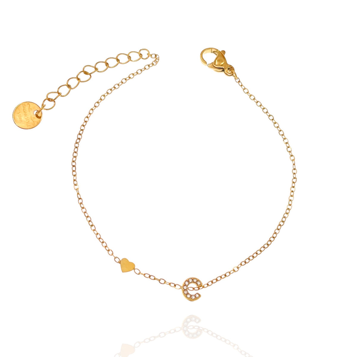 Bracciale con iniziale e zirconi colore oro