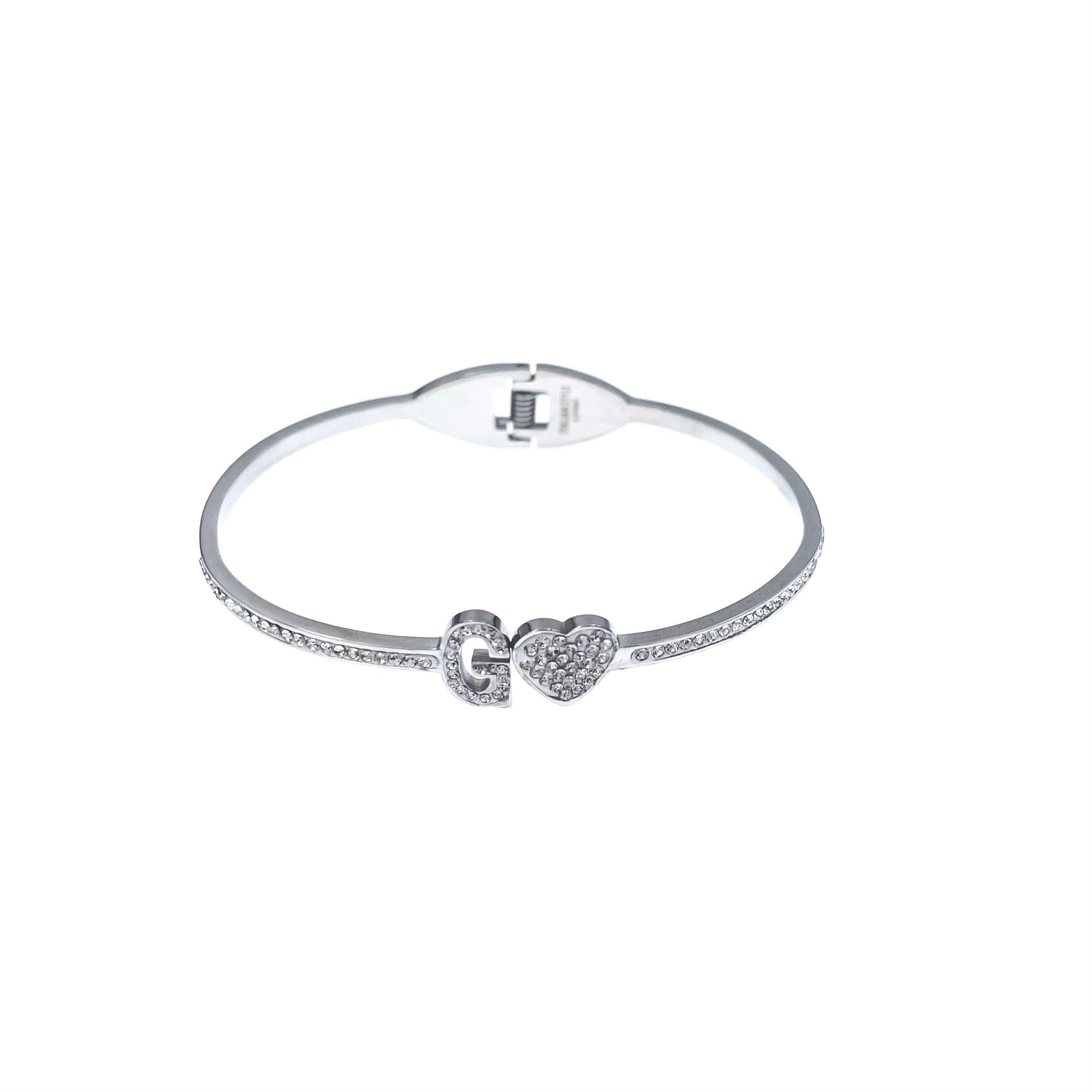 Bracciale rigido in oro bianco 750 con scritta FOREVER in diamanti | GV
