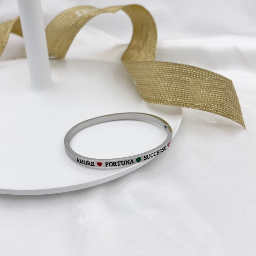 Bracciale braccialetto con scritta frase in acciaio argento e dintorni 
